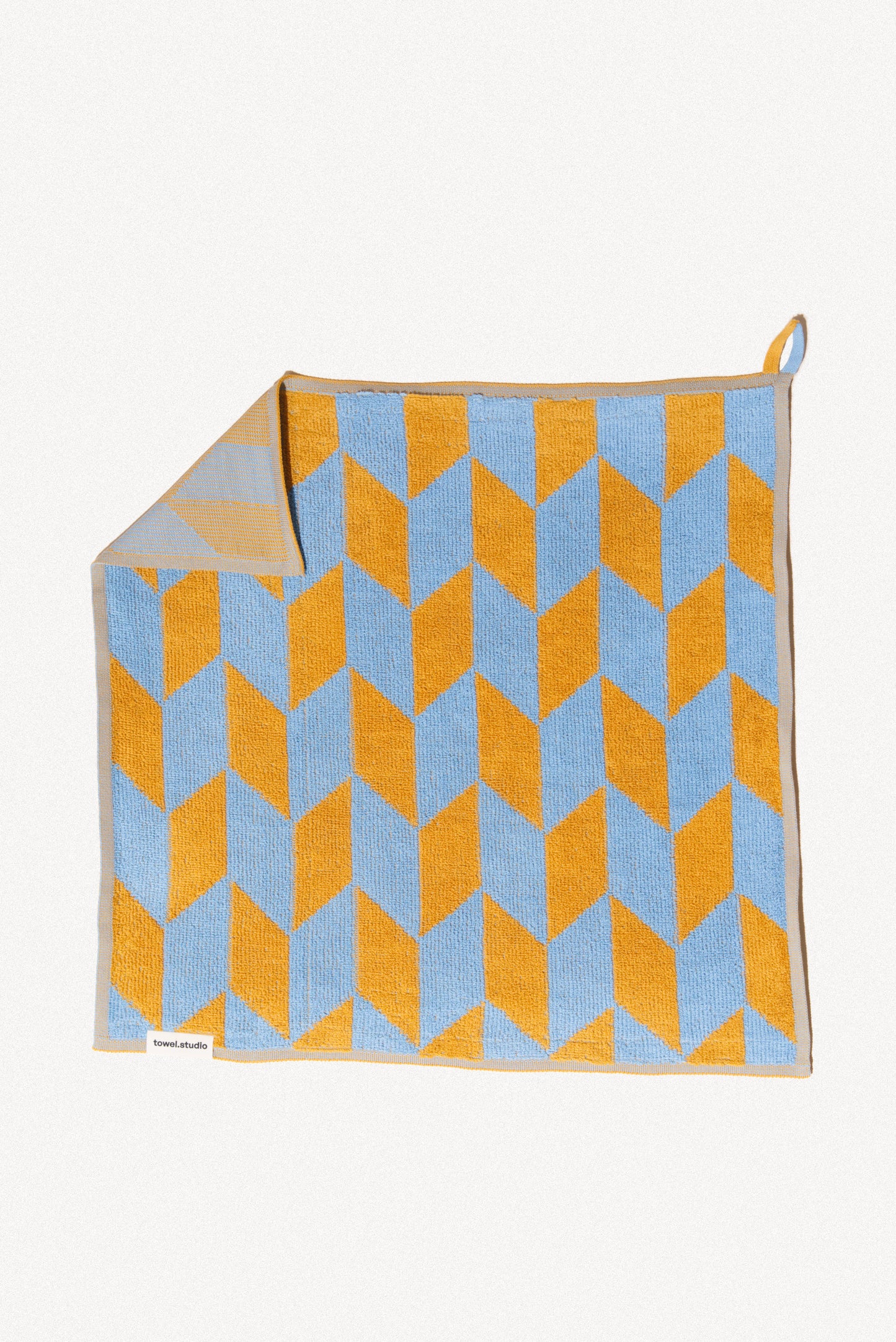 Arrow Tail Guest Towel | Caramel & Sky